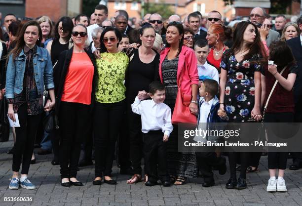 The family of Gerry Conlon, who was wrongly convicted of the 1974 IRA Guildford pub bombing, arrive at St Peter's Cathedral, Belfast, for his funeral.