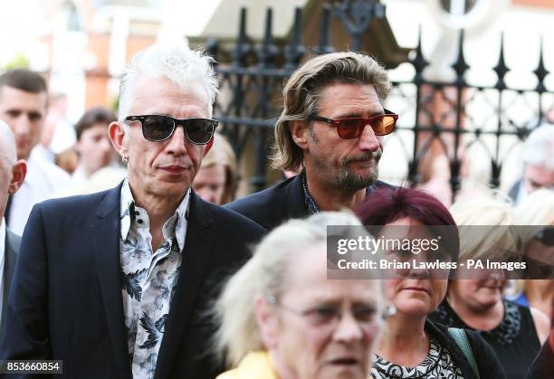Alabama 3 band members Larry Love and Nick Reynolds attend the funeral of Gerry Conlon, who was wrongly convicted of the 1974 IRA Guildford pub...