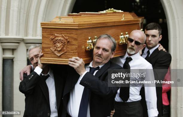 Birmingham Six member Paddy Hill and Guilford Four member Paddy Armstrong carry the coffin of Gerry Conlon, who was wrongly convicted of the 1974 IRA...
