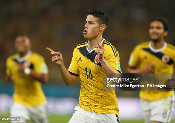 Colombia's James Rodriguez celebrates scoring their first goal of the game during the FIFA World Cup, Round of 16 match at the Estadio do Maracana,...