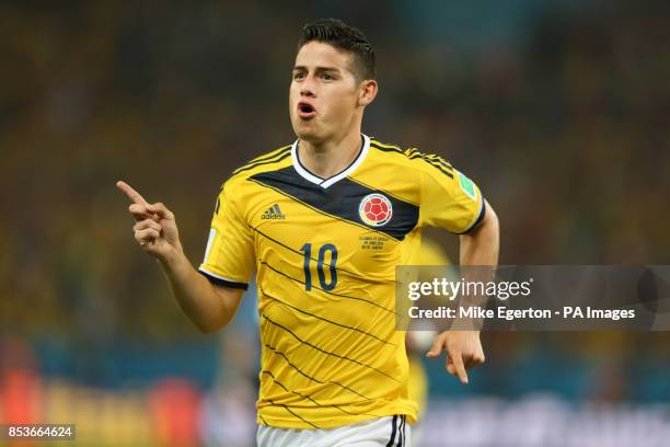 Colombia's James Rodriguez celebrates scoring their first goal of the game during the FIFA World Cup, Round of 16 match at the Estadio do Maracana,...