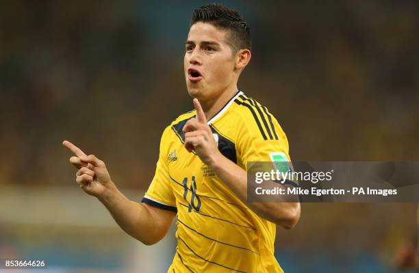 Colombia's James Rodriguez celebrates scoring their first goal of the game during the FIFA World Cup, Round of 16 match at the Estadio do Maracana,...