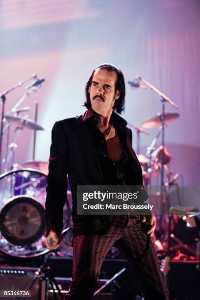 Photo of Nick CAVE & THE BAD SEEDS and Nick CAVE, Nick Cave performing on stage