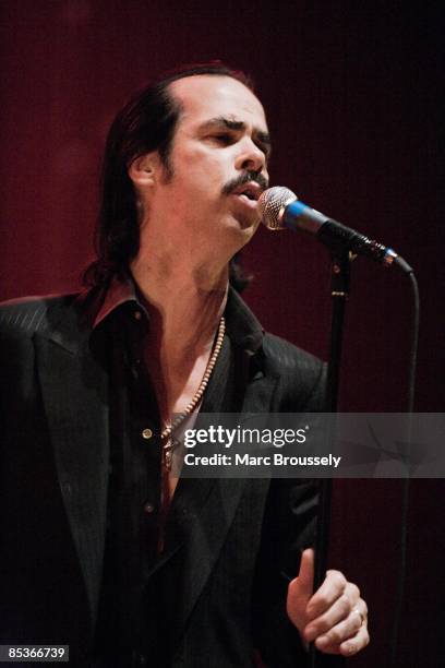 Photo of Nick CAVE & THE BAD SEEDS and Nick CAVE, Nick Cave performing on stage