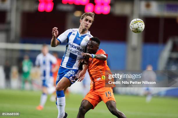 Thomas Rogne of IFK Goteborg and Mohammed Buya Turay of Athletic FC Eskilstuna during the Allsvenskan match between Athletic FC Eskilstuna and IFK...