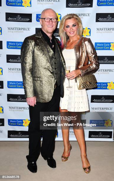 John Caudwell and Claire Johnson attending the Marie Curie Timeless Party at the Royal Hospital in Chelsea, London.