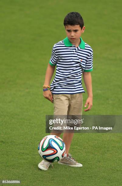 Robin van Persie's son Shaqueel after the training session at Estadio Jose Bastos Padilha, Rio de Janeiro, Brazil.