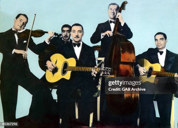 Circa 1970: Photo of QUINTETTE DU HOT CLUB DE FRANCE and Django REINHARDT and Stephane GRAPPELLI and HOT CLUB QUINTET FRANCE; with the Hot Club...