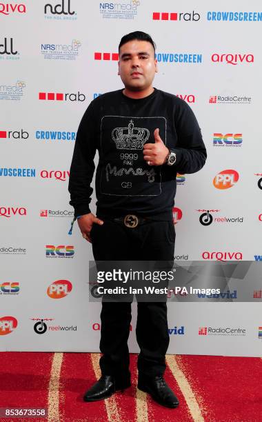 Naughty Boy arriving at the Arqiva Commercial Radio Awards at the Westminster Bridge Park Plaza Hotel, London.