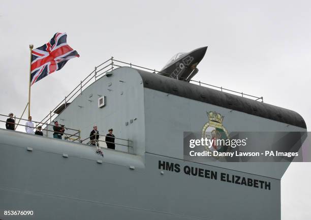 Lightning II sits on the deck of HMS Queen Elizabeth in Rosyth Dockyard, Fife, as the Queen will formally name the Royal Navy's biggest ever ship,...