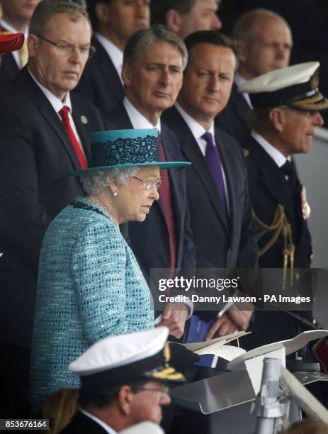 Queen Elizabeth II officially names Royal Navy's new aircraft carrier HMS Queen Elizabeth, with Defence Secretary Philip Hammond and Prime Minister...