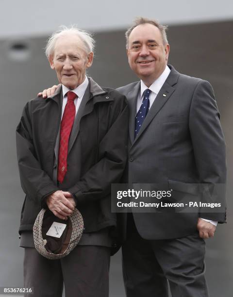 First Minister Alex Salmond with father Robert Salmond as Queen Elizabeth II officially named Royal Navy's new aircraft carrier HMS Queen Elizabeth...