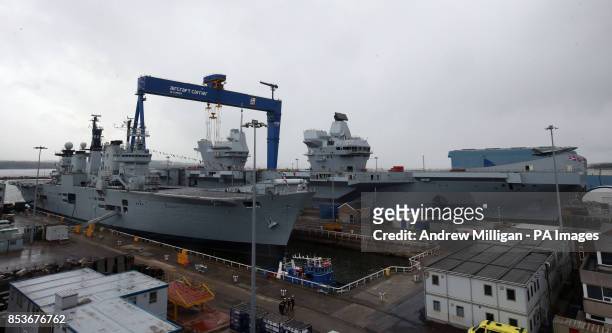 Illustrious alongside HMS Queen Elizabeth after the formal naming ceremony at in Rosyth Dockyard, Fife.