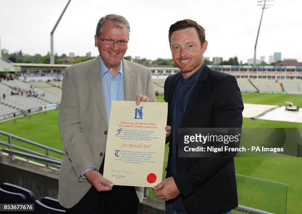 Ian Bell receives a certificate marking his 100 caps for England, presented by Norman Gascoigne, Chairman of Warwickshire CCC during the T20 Blast...