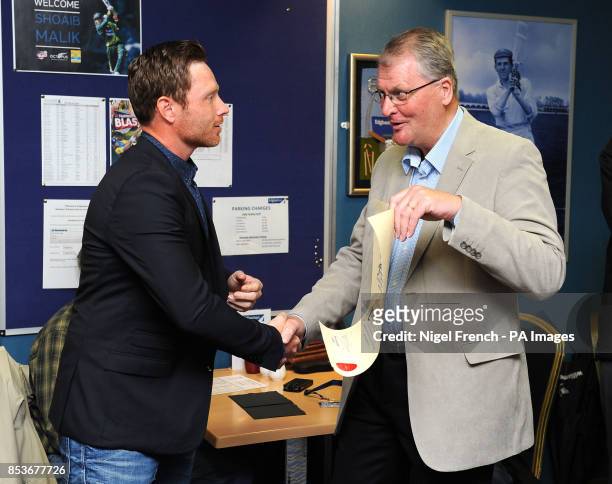 Ian Bell receives a honorary life membership of Warwickshire CCC from Norman Gascoigne to mark his 100th cap for England during the T20 Blast match...