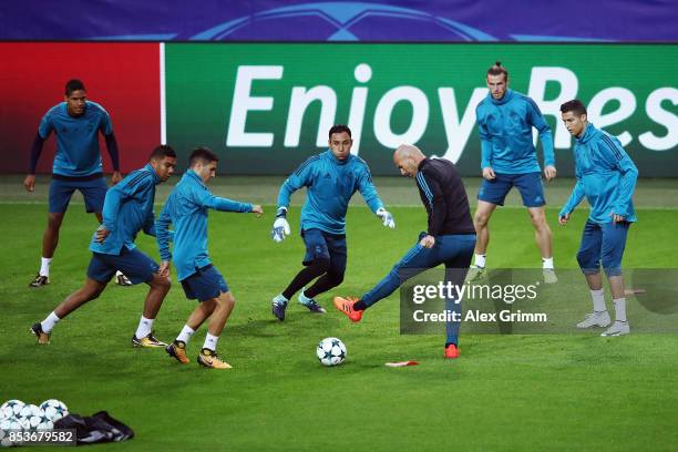 Head coach Zinedine Zidane attends a Real Madrid training session ahead of their UEFA Champions League Group H match against Borussia Dortmund at...