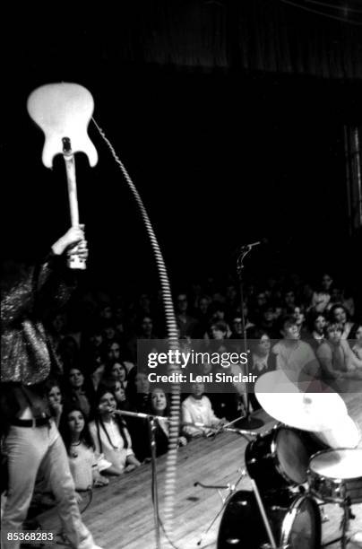 Guitarist Fred "Sonic" Smith of The group MC5 smashes his guitar on stage in 1969 in East Lansing, Michigan.