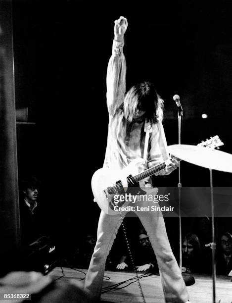 Guitarist Fred "Sonic" Smith of The group MC5 performs live in 1969 in East Lansing, Michigan.