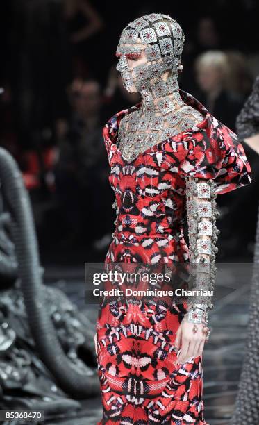 Model walks the runway at the Alexander McQueen Ready-to-Wear A/W 2009 fashion show during Paris Fashion Week at POPB on March 10, 2009 in Paris,...