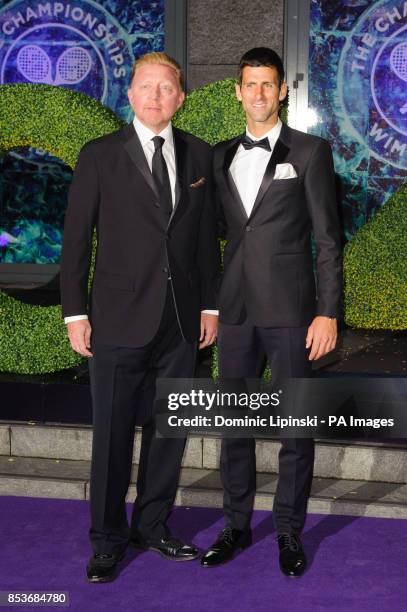Wimbledon men's singles winner Novak Djokovic and coach Boris Becker arriving at the Wimbledon Champions Dinner 2014, at the Royal Opera House, in...
