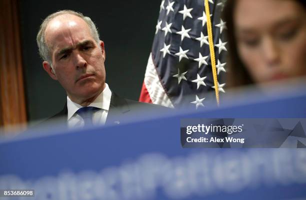 Sen. Robert Casey listens during a news conference on health care September 25, 2017 on Capitol Hill in Washington, DC. Patient groups gathered on...