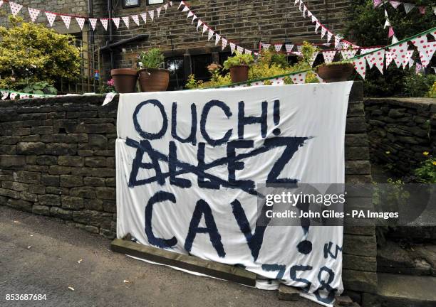 Reference to the crash of Mark Cavendish on Stage 1 of the Tour de France on Holme Moss as the race leaves the UK to continue its journey.
