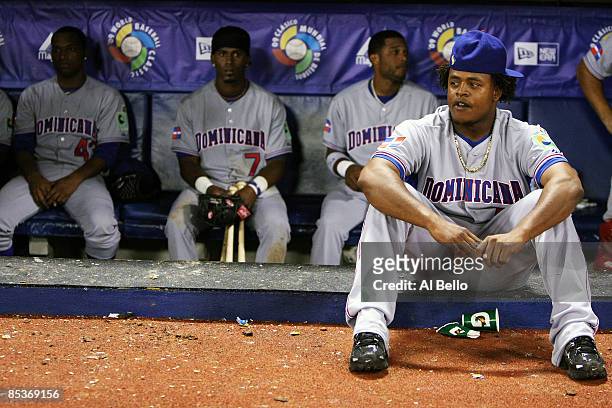 Edinson Volquez , Damaso Marte, Jose Reyes and Robinson Cano of the Dominican Republic react after losing 2-1 against the Netherlands during the 2009...