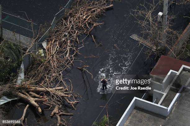 Flooded street is seen as people deal with the aftermath of Hurricane Maria on September 25, 2017 in San Juan Puerto Rico. Maria left widespread...