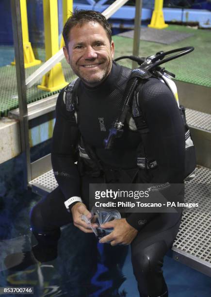 Shark Trust patron and wildlife TV presenter Steve Backshall about to swim with sharks to launch the Shark Trust No Limits? campaign at SEA LIFE...