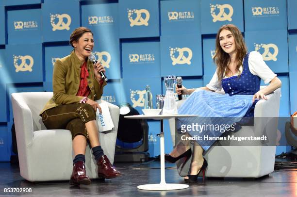 Actress Carice van Houten and Funda Vanroy during the 'Bits & Pretzels Founders Festival' at ICM Munich on September 25, 2017 in Munich, Germany.