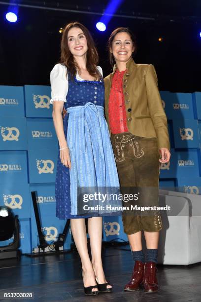 Actress Carice van Houten and Funda Vanroy during the 'Bits & Pretzels Founders Festival' at ICM Munich on September 25, 2017 in Munich, Germany.