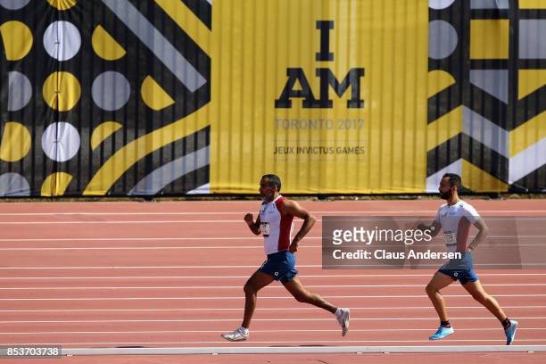 Djamel Mastouri and Jonathan Hamou of France compete in the Men's IT3 1500m Final during Day Three of the Invictus Games 2017 at York Lions Stadium...