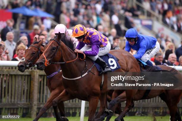 Nakuti ridden by Ryan Moore wins the Price Bailey EBF stallions fillies' handicap stakes during the QIPCO Falmouth Stakes Day of the July Festival at...