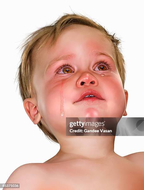 baby in tears - gandee stock pictures, royalty-free photos & images