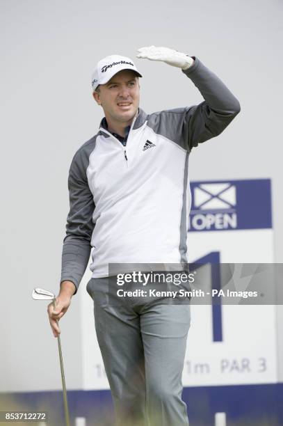 Scotland's Marc Warren keeps an eye on his tee shot at the par 3 11th hole during day three of the Aberdeen Asset Management Scottish Open at Royal...