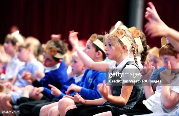 Michael Rosen , author of We're Going On a Bear Hunt, gives a reading lesson to 1438 children as they break the record for the largest reading lesson...