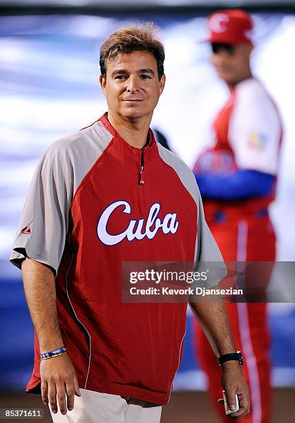 Team doctor and son of Cuba's former President Fidel Castro, Antonio Castro wlaks during warm upbefore the game against Australia during the 2009...