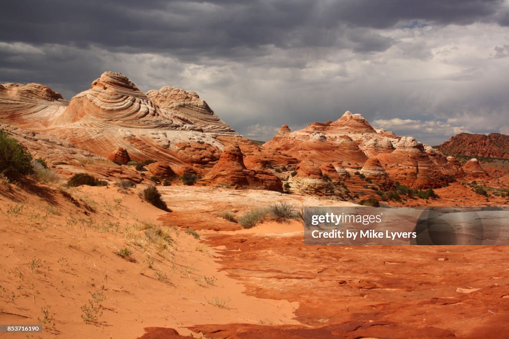 Stormy sky over the striped "teepees", North Coyote Buttes
