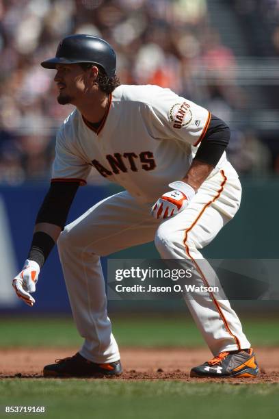 Jarrett Parker of the San Francisco Giants leads off first base against the Arizona Diamondbacks during the second inning at AT&T Park on September...