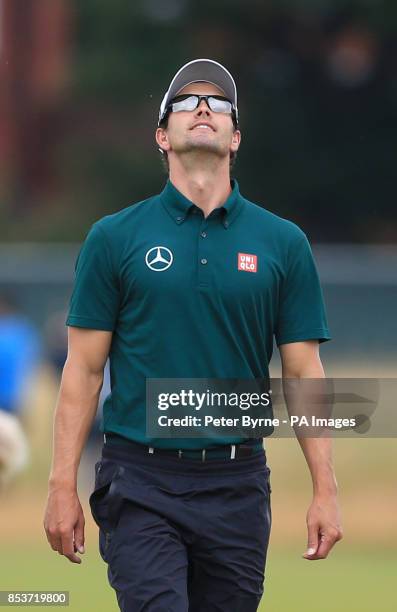 Australia's Adam Scott looks up to the skies during practice day four of the 2014 Open Championship at Royal Liverpool Golf Club, Hoylake.