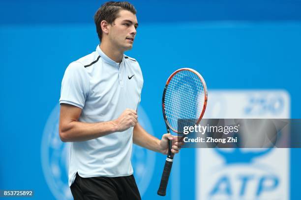 Taylor Fritz of the United States celebrates a shot during the match against Di Wu of China during Day 1 of 2017 ATP Chengdu Open at Sichuan...