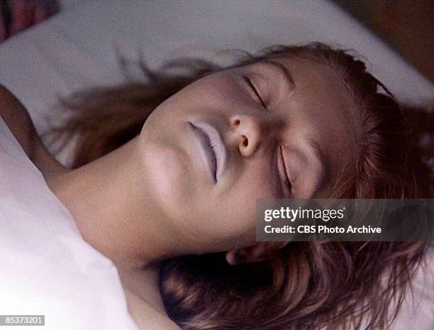 Close-up of German-born American actress Sheryl Lee as she lies on a hospital gurney in a scene screen grab from the pilot episode of the television...