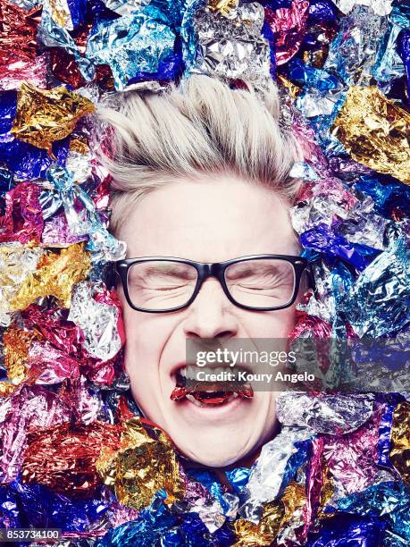 American YouTube and podcast personality, author and activist Tyler Oakley is photographed for Simon & Schuster on April 3, 2015 in Los Angeles,...