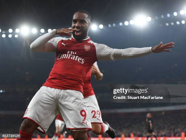 Alex Lacazette of Arsenal celebrates scoring for Arsenal during the Premier League match between Arsenal and West Bromwich Albion at Emirates Stadium...