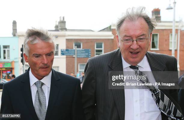 Former junior minister and Fianna Fail TD Ivor Callely accompanied by his solicitor Noel O'Hanrahan, leaves the Circuit Criminal Court, Criminal...
