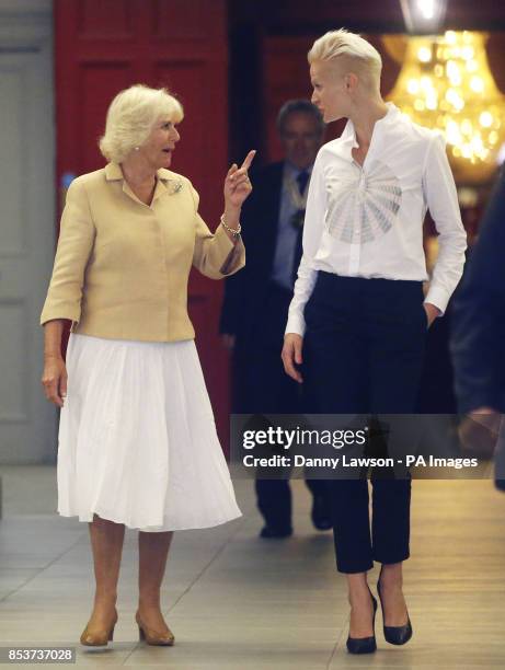 The Duchess of Cornwall with model Anna Freemantle during a visit to the Edinburgh Fashion Festival at the Assembly Rooms in Edinburgh, Scotland.