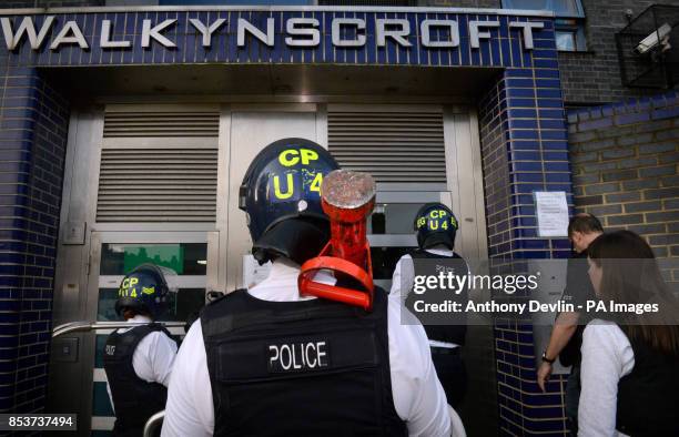 City of London Police execute a warrant at an address in Peckham, London, in connection with a criminal ring linking Russian hackers and ID thieves...
