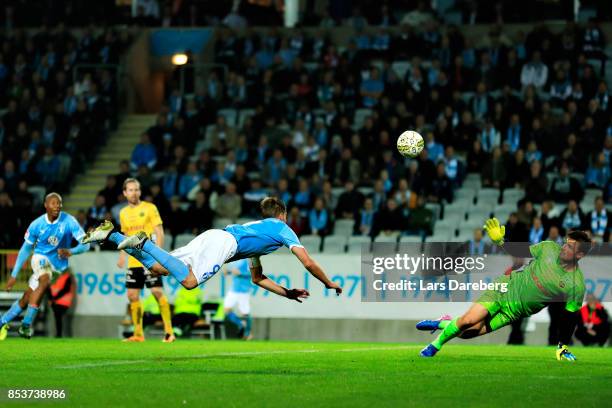 Markus Rosenberg of Malmo FF and Kevin Stuhr-Ellegaard, goalkeeper of IF Elfsborg during the Allsvenskan match between Malmo FF and IF Elfsborg at...