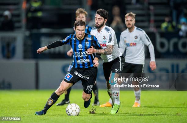 Jesper Arvidsson of IK Sirius FK and Nahir Besara of Orebro SK during the Allsvenskan match between IK Sirius FK and Orebro SK at Studenternas IP on...