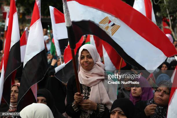 Palestinians wave the Egyptian flags during a rally to say ''Thank'' to Egypt for its support for Palestinian reconciliation, in Gaza city on...